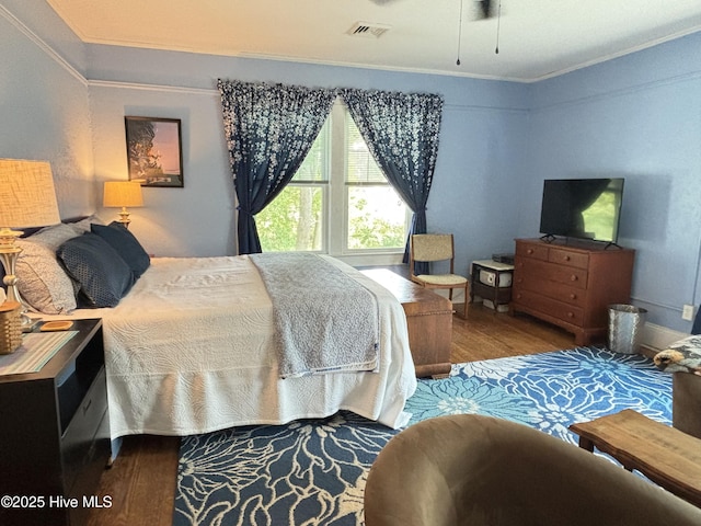 124 W Main St, Woodland, NC 27897 - bedroom featuring crown molding and wood finished floors