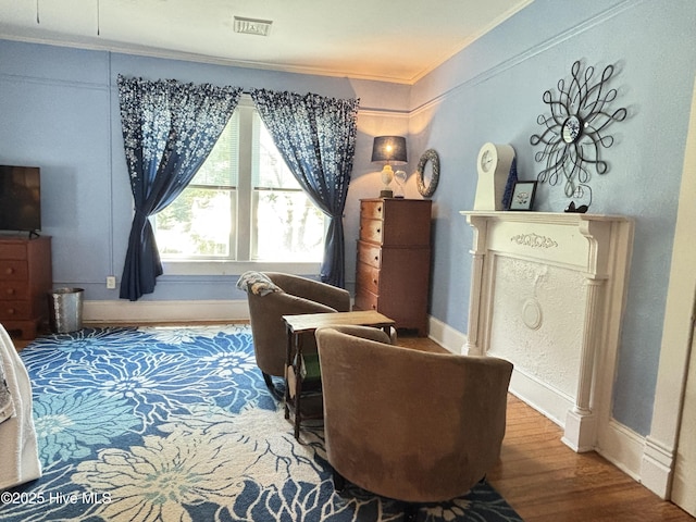 124 W Main St, Woodland, NC 27897 - sitting room with crown molding and wood finished floors