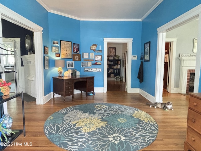124 W Main St, Woodland, NC 27897 - hallway with wood finished floors and crown molding