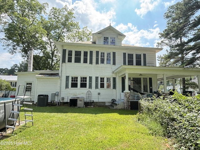 124 W Main St, Woodland, NC 27897 - rear view of property with a lawn, ceiling fan, and covered porch