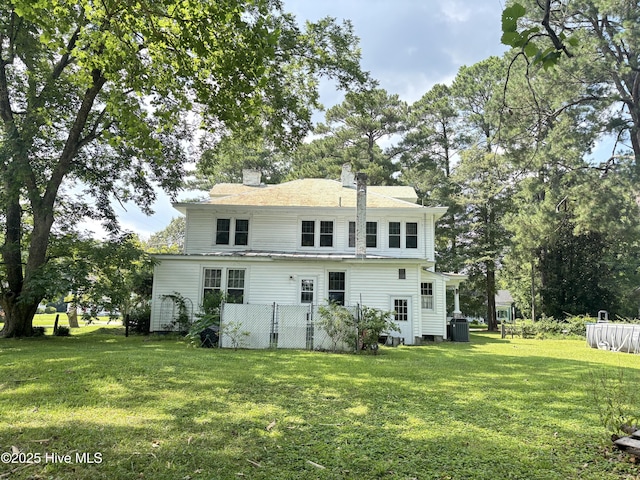 124 W Main St, Woodland, NC 27897 - rear view of property with a yard and a chimney