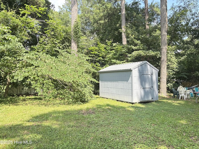 124 W Main St, Woodland, NC 27897 - view of grassy yard featuring a storage unit