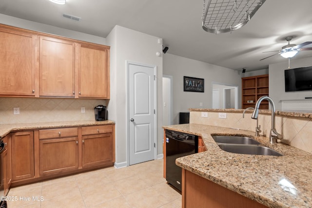 213 Wynbrookee Ln, Jacksonville, NC 28546 - kitchen with black dishwasher, backsplash, light tile patterned floors, ceiling fan, and light stone countertops