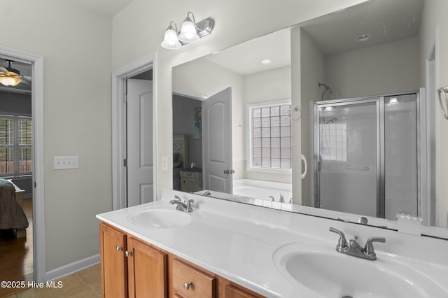 213 Wynbrookee Ln, Jacksonville, NC 28546 - ensuite bathroom with plenty of natural light, a stall shower, double vanity, and a bath