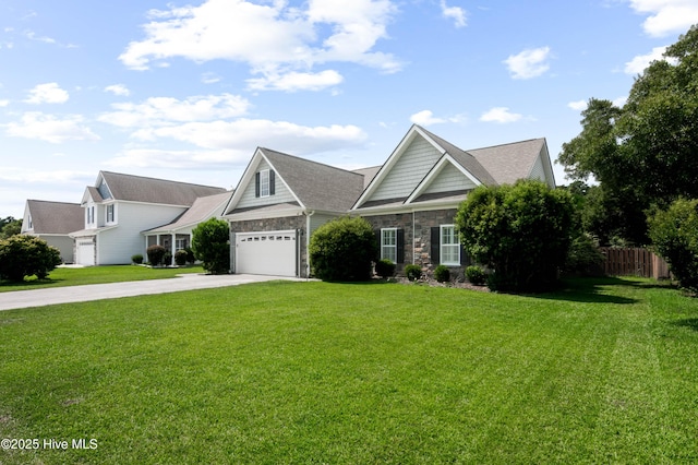 213 Wynbrookee Ln, Jacksonville, NC 28546 - view of front of home featuring driveway, a garage, and stone siding