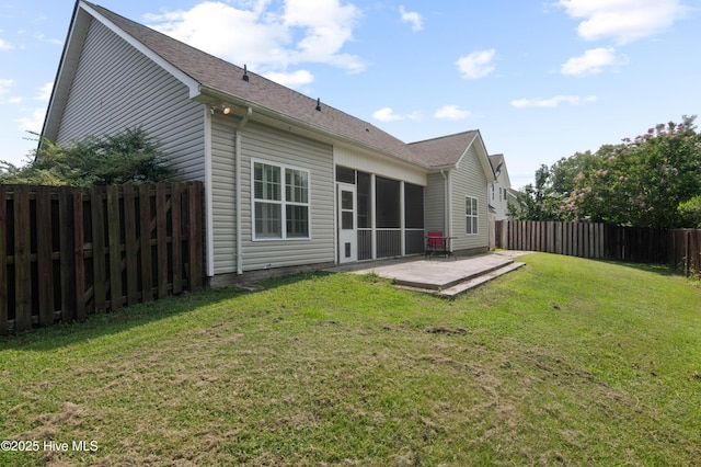 213 Wynbrookee Ln, Jacksonville, NC 28546 - rear view of property featuring a fenced backyard, a sunroom, and a patio