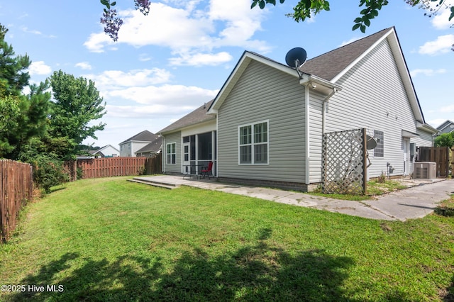 213 Wynbrookee Ln, Jacksonville, NC 28546 - rear view of house featuring a fenced backyard, a patio, and roof with shingles