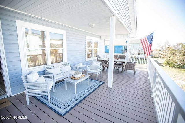 130 Crab St, Holden Beach, NC 28462 - wooden terrace with outdoor lounge area and outdoor dining space
