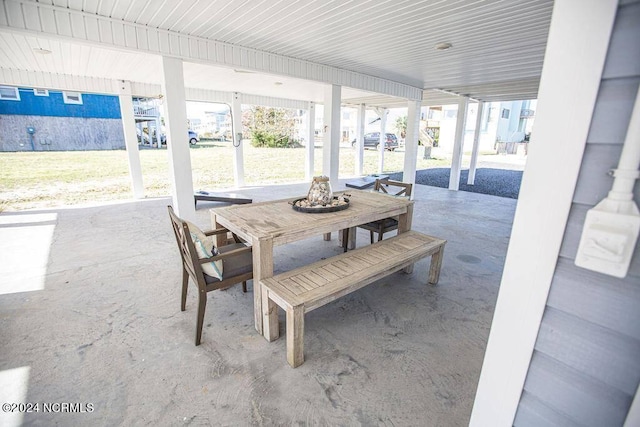 130 Crab St, Holden Beach, NC 28462 - view of patio with outdoor dining area