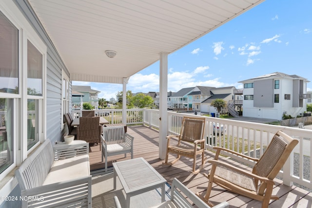 130 Crab St, Holden Beach, NC 28462 - wooden terrace with a residential view