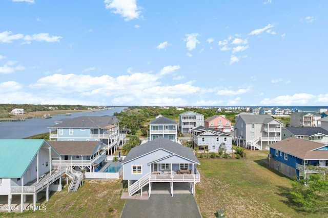 130 Crab St, Holden Beach, NC 28462 - aerial perspective of suburban area with a large body of water