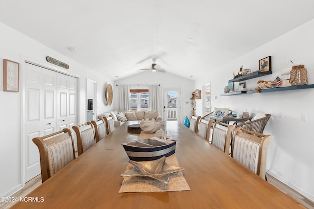 130 Crab St, Holden Beach, NC 28462 - dining room featuring lofted ceiling, a ceiling fan, and wood finished floors