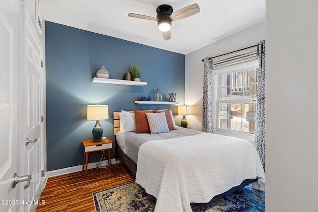 215 S Water St Apt 206, Wilmington, NC 28401 - bedroom featuring wood finished floors and a ceiling fan
