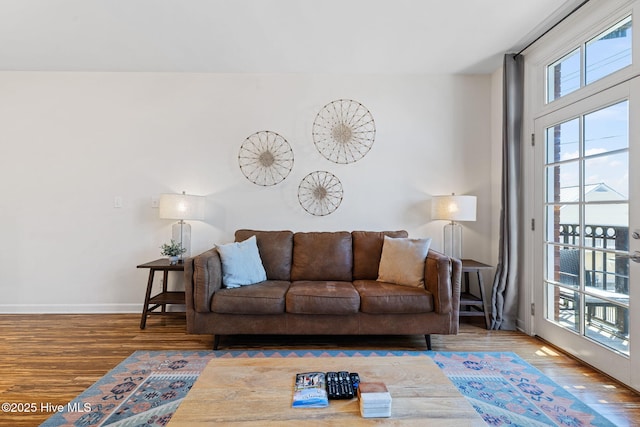 215 S Water St Apt 206, Wilmington, NC 28401 - living area featuring wood finished floors and healthy amount of natural light