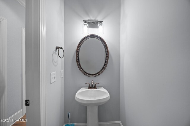2324 Dovedale Dr Unit B, Greenville, NC 27834 - bathroom featuring baseboards
