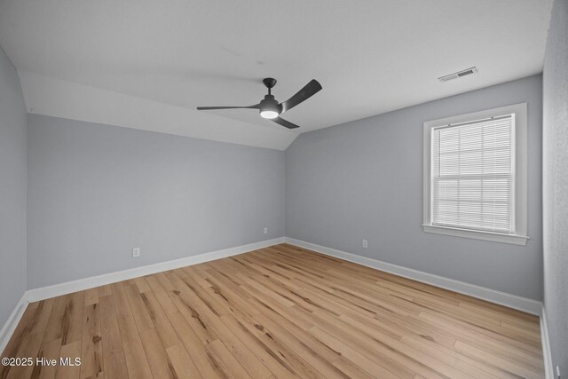2324 Dovedale Dr Unit B, Greenville, NC 27834 - unfurnished room featuring vaulted ceiling, light wood-style floors, and ceiling fan