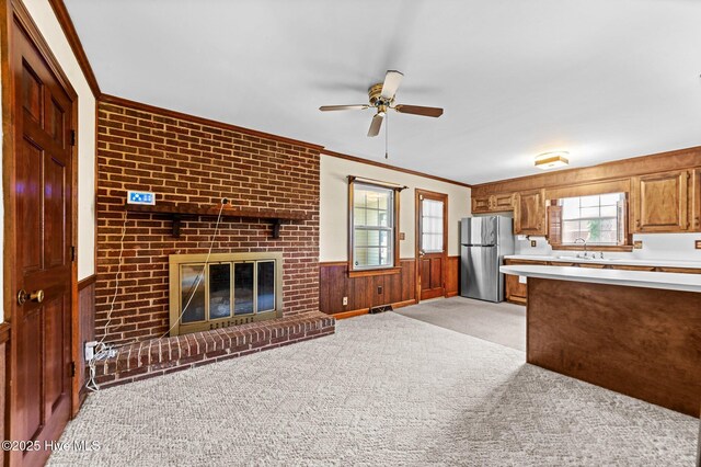 6715 Clarks Neck Rd, Washington, NC 27889 - kitchen with freestanding refrigerator, light carpet, a ceiling fan, light countertops, and healthy amount of natural light