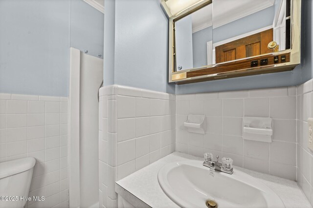 6715 Clarks Neck Rd, Washington, NC 27889 - bathroom featuring tile walls, vanity, and a wainscoted wall