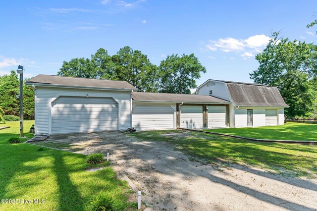 6715 Clarks Neck Rd, Washington, NC 27889 - garage featuring dirt driveway