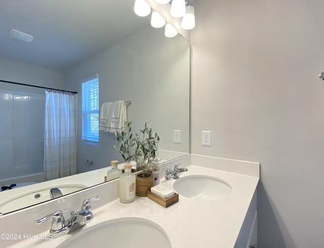 5191 Meagan Ln NE, Winnabow, NC 28479 - bathroom featuring double vanity and a shower with shower curtain