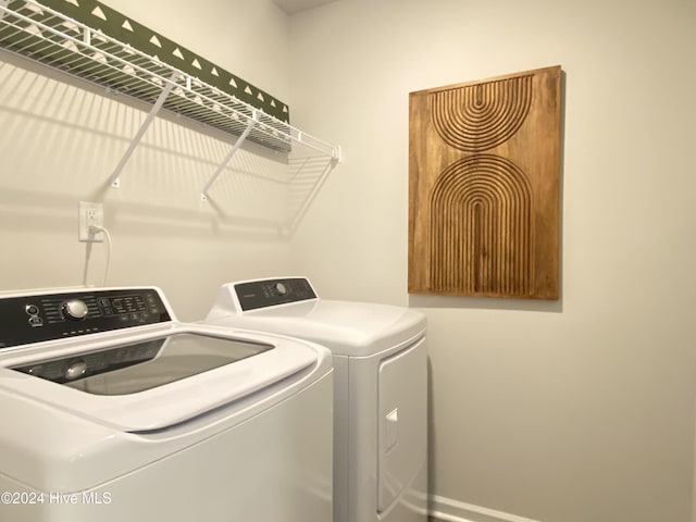 5191 Meagan Ln NE, Winnabow, NC 28479 - washroom featuring washer and dryer and baseboards