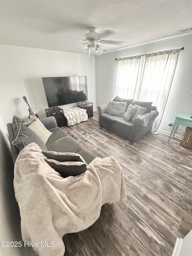 106 Cotton Ct, Camden, NC 27921 - living area with wood finished floors and a ceiling fan