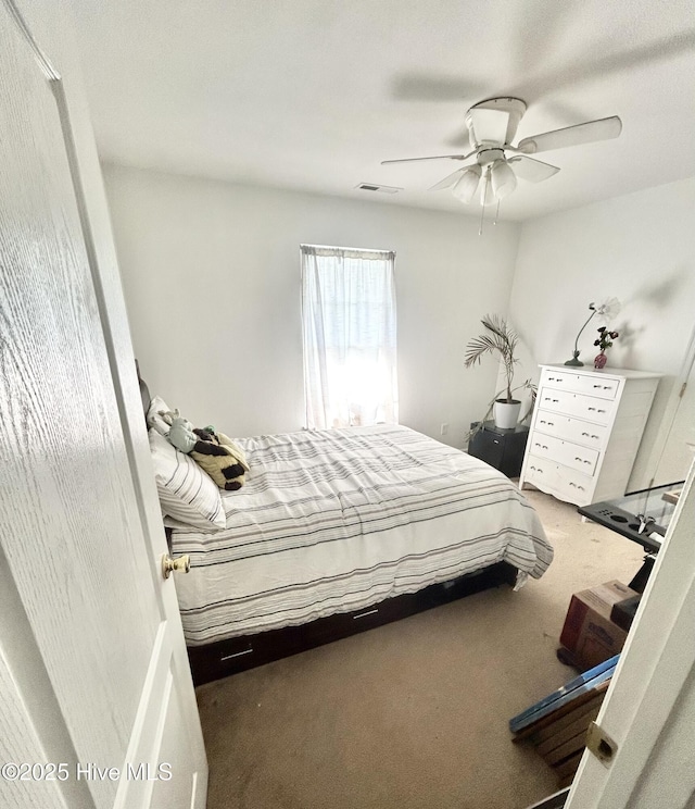 106 Cotton Ct, Camden, NC 27921 - carpeted bedroom featuring a ceiling fan