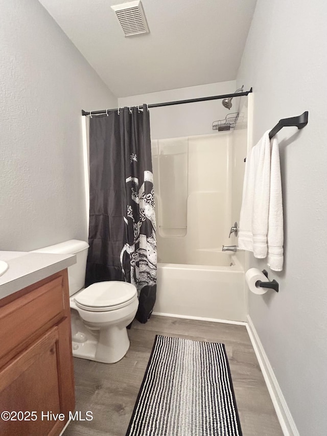 106 Cotton Ct, Camden, NC 27921 - full bathroom with wood finished floors, vanity, shower / tub combo, and vaulted ceiling