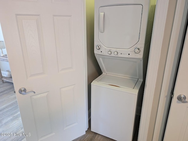 3 Sloop St, Swansboro, NC 28584 - laundry area with stacked washing machine and dryer and wood finished floors