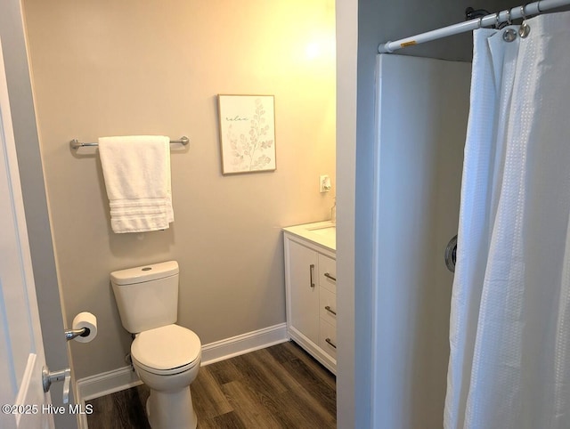 3 Sloop St, Swansboro, NC 28584 - full bath with wood finished floors, vanity, and a shower with shower curtain
