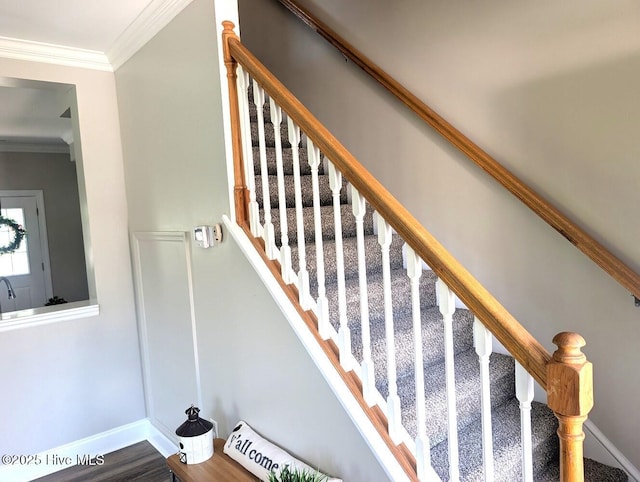 3 Sloop St, Swansboro, NC 28584 - staircase with ornamental molding and baseboards