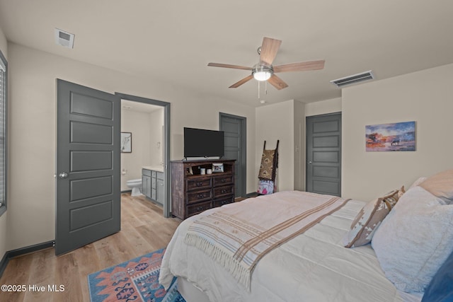 125 Trellis Ln, Vanceboro, NC 28586 - bedroom featuring light wood-style floors, ensuite bathroom, and a ceiling fan