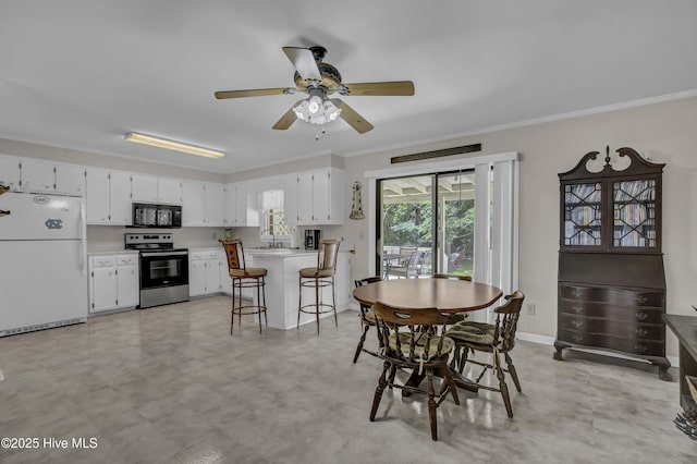 605 Mohican Trl, Wilmington, NC 28409 - dining space with crown molding, ceiling fan, and light floors