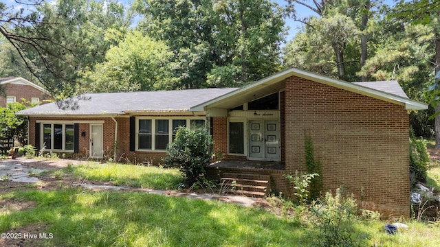 916 Corbitt Dr, Weldon, NC 27890 - view of front of property with brick siding