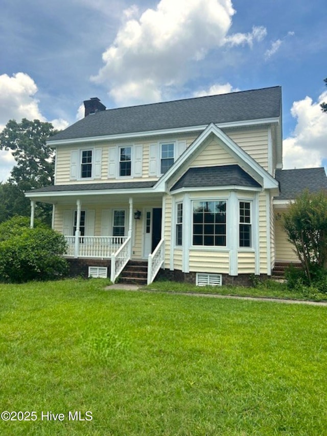 1109 Beechwood Dr, Rocky Mount, NC 27803 - view of front of property with covered porch, a chimney, a front lawn, and a shingled roof