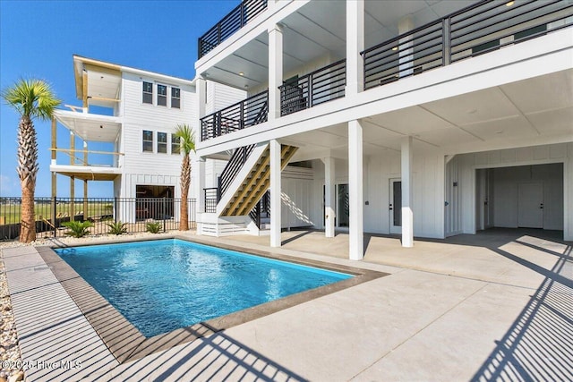 47 Grande View Dr, Ocean Isle Beach, NC 28469 - view of pool with a patio area and stairway