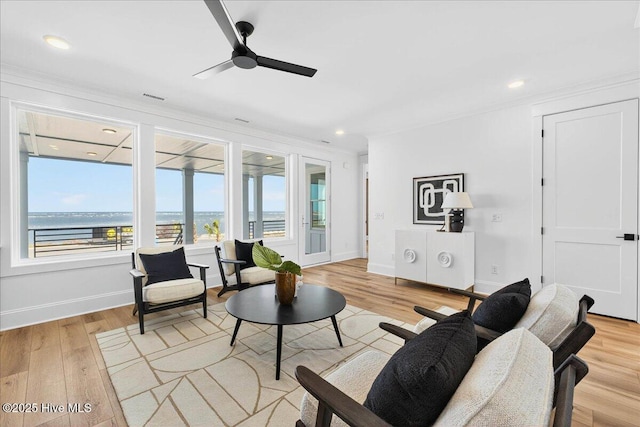 47 Grande View Dr, Ocean Isle Beach, NC 28469 - living room with ornamental molding, a ceiling fan, light wood-style flooring, and recessed lighting