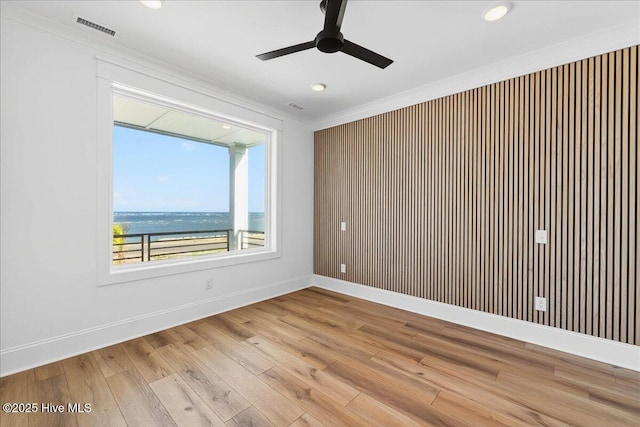 47 Grande View Dr, Ocean Isle Beach, NC 28469 - unfurnished room with ceiling fan, wood finished floors, ornamental molding, and recessed lighting