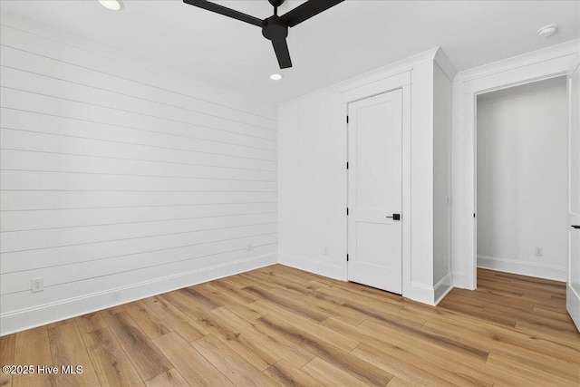 47 Grande View Dr, Ocean Isle Beach, NC 28469 - unfurnished bedroom featuring light wood-style flooring, crown molding, recessed lighting, and a ceiling fan