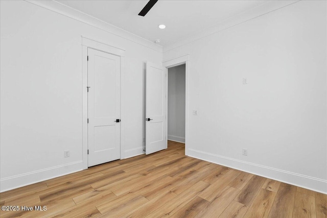 47 Grande View Dr, Ocean Isle Beach, NC 28469 - unfurnished bedroom with light wood-style floors, ceiling fan, recessed lighting, and ornamental molding