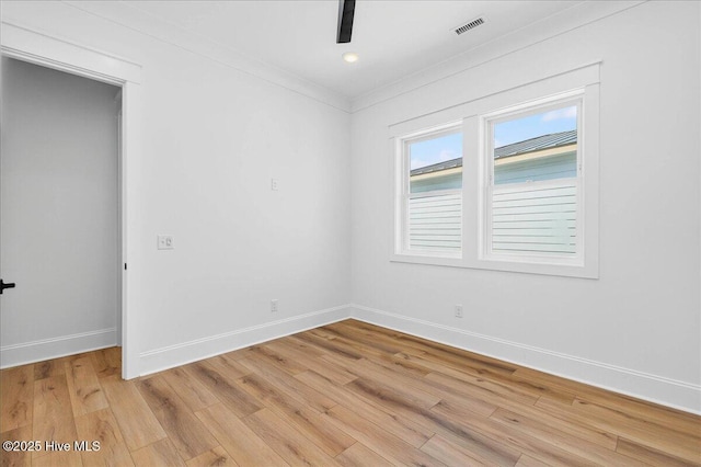 47 Grande View Dr, Ocean Isle Beach, NC 28469 - unfurnished room featuring baseboards and light wood-style flooring