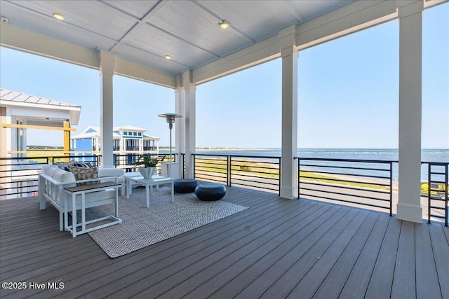 47 Grande View Dr, Ocean Isle Beach, NC 28469 - wooden terrace with a water view and an outdoor living space