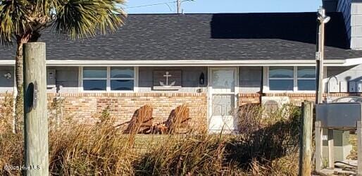 109 Cedar Ln Unit 2, Cedar Point, NC 28584 - view of front facade featuring brick siding