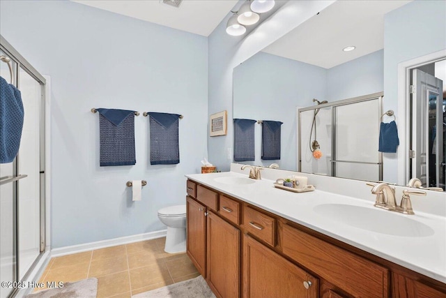 5198 Windlass Rd, Southport, NC 28461 - bathroom featuring a stall shower, double vanity, and tile patterned floors