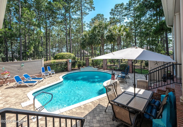 6601 Annesbrook Pl, Ocean Isle Beach, NC 28469 - view of pool featuring a patio and view of scattered trees