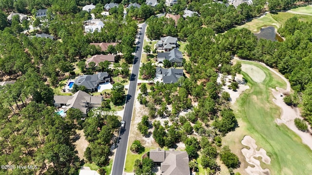 6601 Annesbrook Pl, Ocean Isle Beach, NC 28469 - aerial view of property and surrounding area featuring a golf club and nearby suburban area
