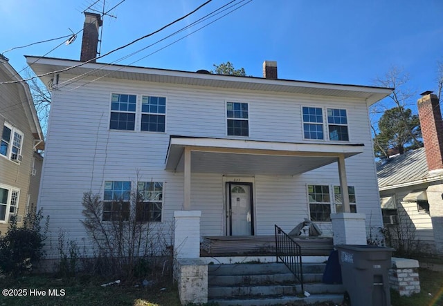827 Sunset Ave, Rocky Mount, NC 27804 - view of front of house with covered porch and a chimney