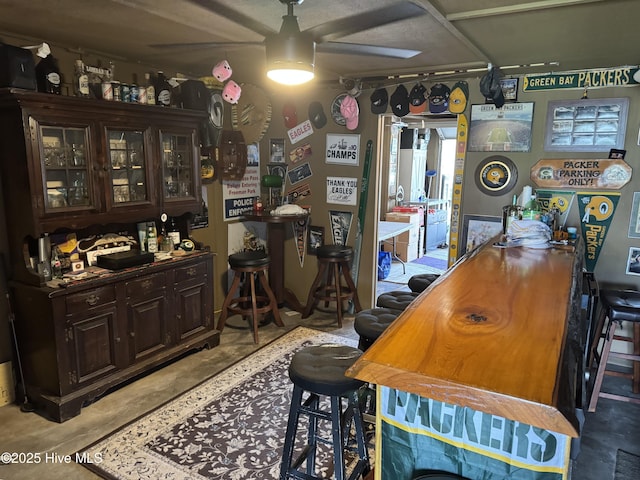 202 Lewis Dr Unit 1212, Carolina Beach, NC 28428 - bar with a ceiling fan and concrete flooring