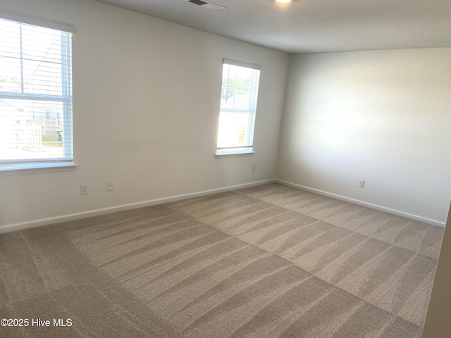 109 Mesa Ln, Holly Ridge, NC 28445 - spare room with light carpet and plenty of natural light
