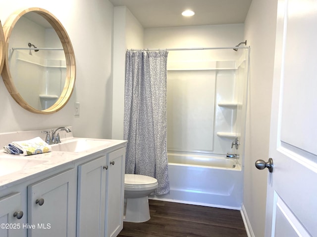 109 Mesa Ln, Holly Ridge, NC 28445 - bathroom featuring wood finished floors, double vanity, shower / tub combo, and recessed lighting